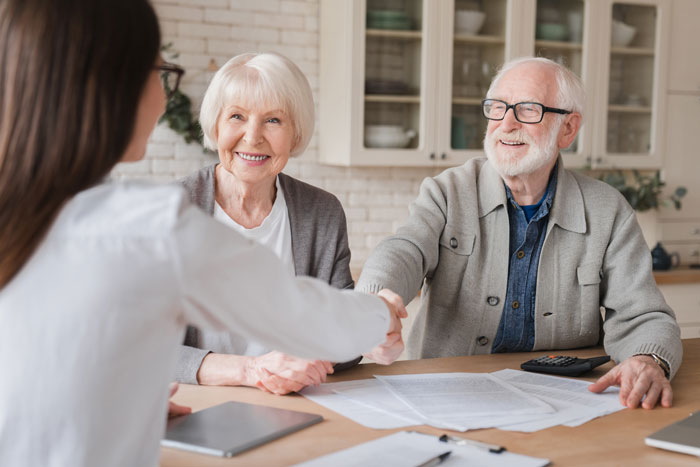 happy-old-elderly-senior-grandparents-family-couple-clients-signs-contracts